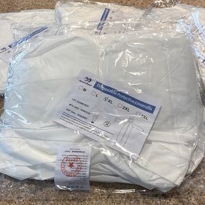 NWT Bundle of 4 Medpurest Disposable Protective Coveralls  XL- I feel run small